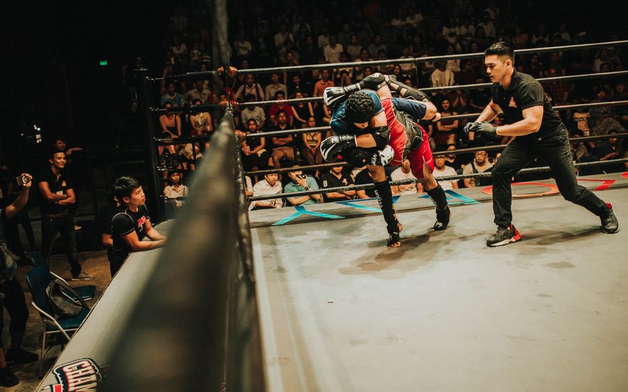 Boxers trading punches in the ring