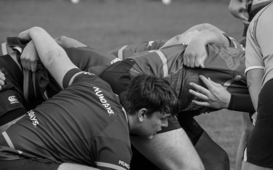 Rugby players contesting possession