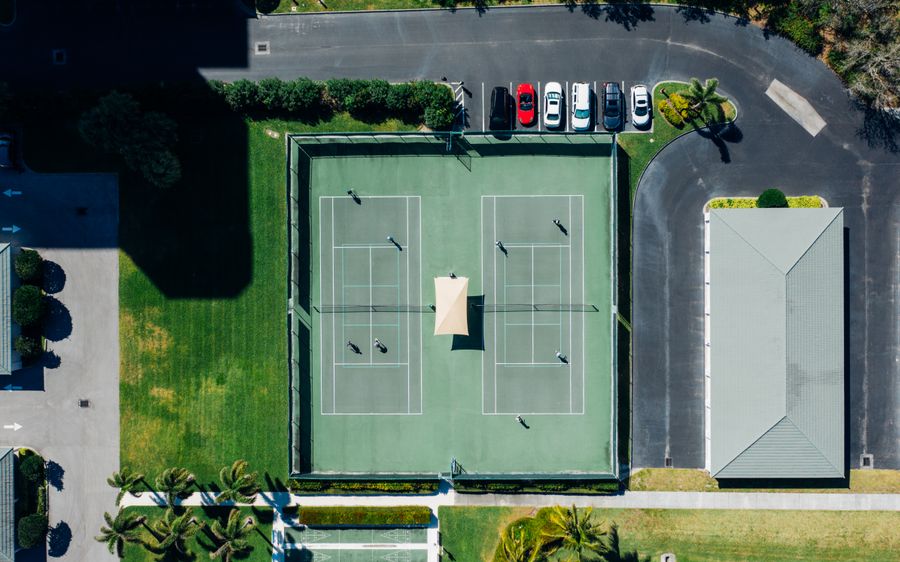 Tennis rally on a hard court